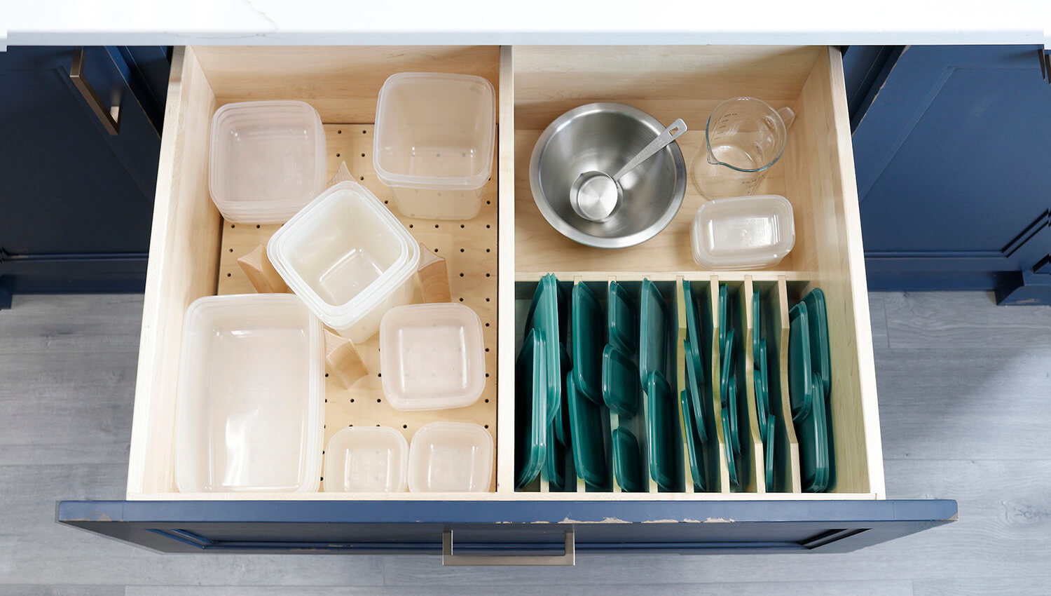 Prepping lunch for school has never been easier with organized lid and food container storage solutions from Dura Supreme Cabinetry.