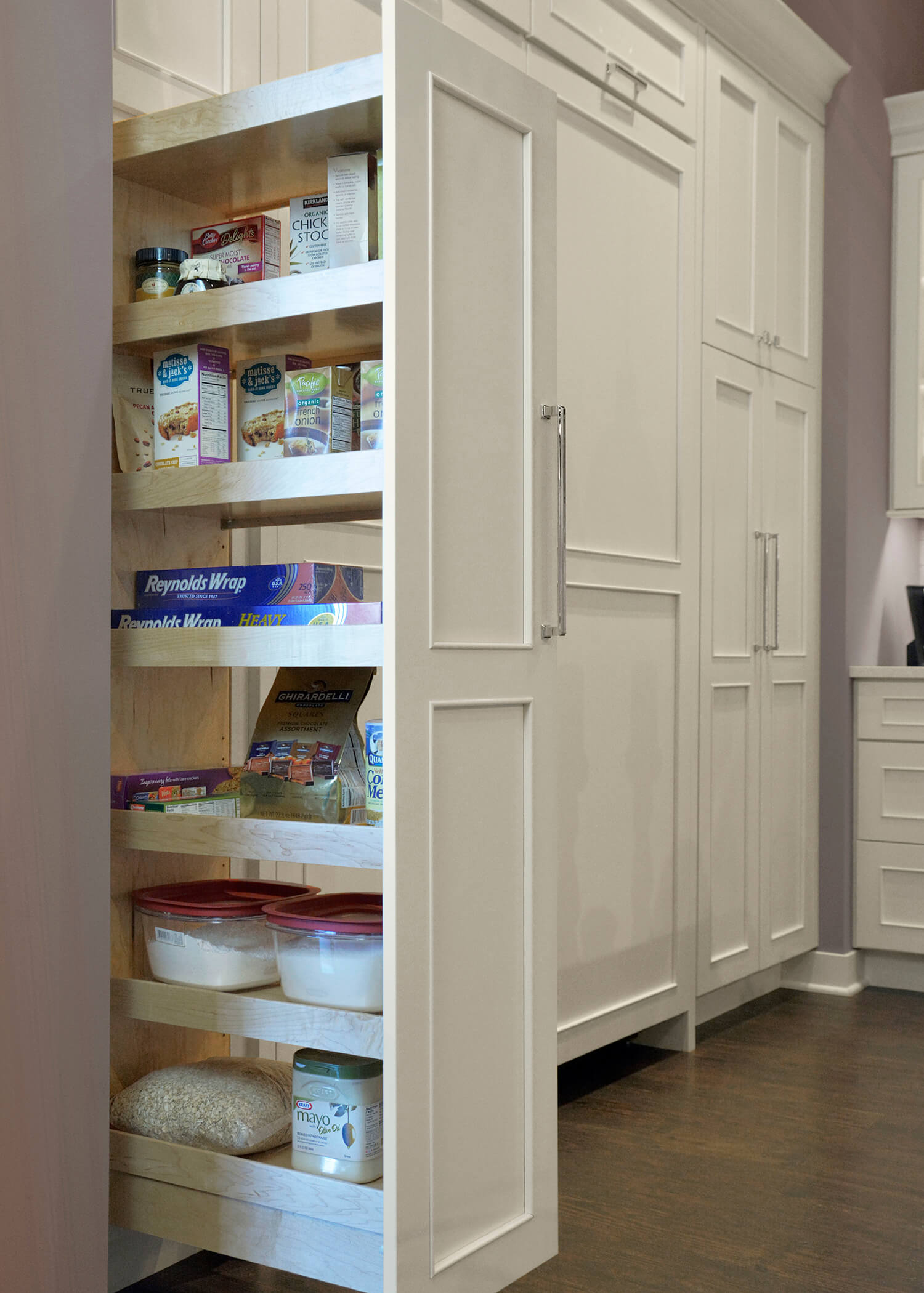 Our Tall Pull-Out Pantry provides an amazing amount of storage on full extension glides. Available with wood (shown) or wired shelves.