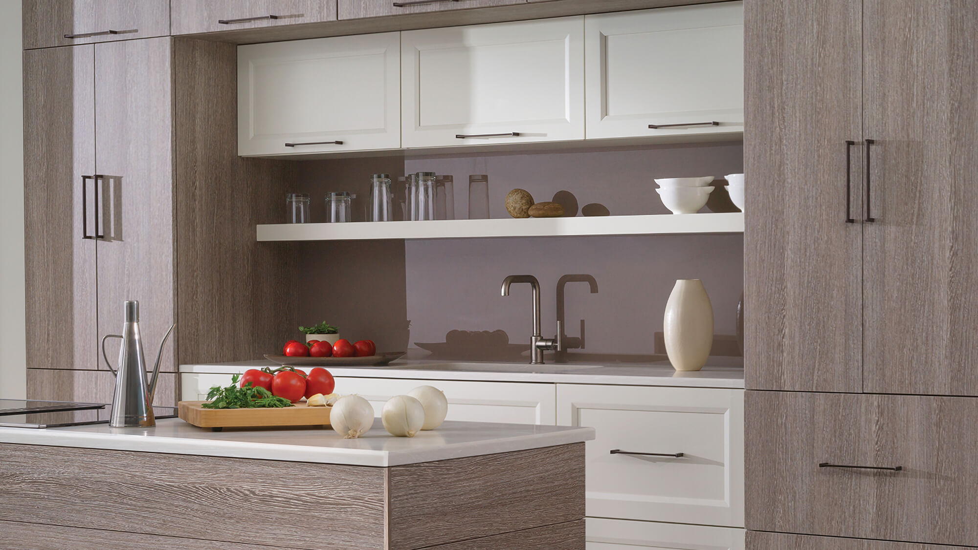 Custom, two-toned kitchen cabinets with an efficient kitchen prep zone centered around the sink with open shelving, integrated storage, and a spacious work surface. Thoughtful cabinetry design keeps meal preparation essentials organized and within easy reach.