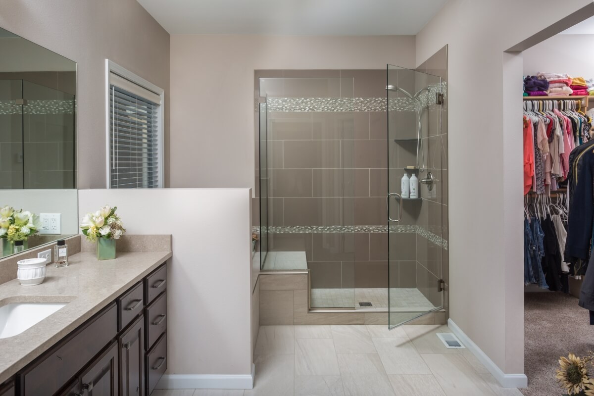 his charming master bathroom provides plenty of clear space for its primary users to function and move around safely. Designed by Danielle Bohn, CKBD at Creative Kitchen Designs, Inc., Alaska.