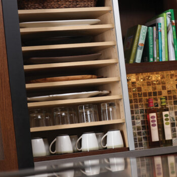 Wall Appliance Cabinet Organized for Tray Storage by Dura Supreme Cabinetry