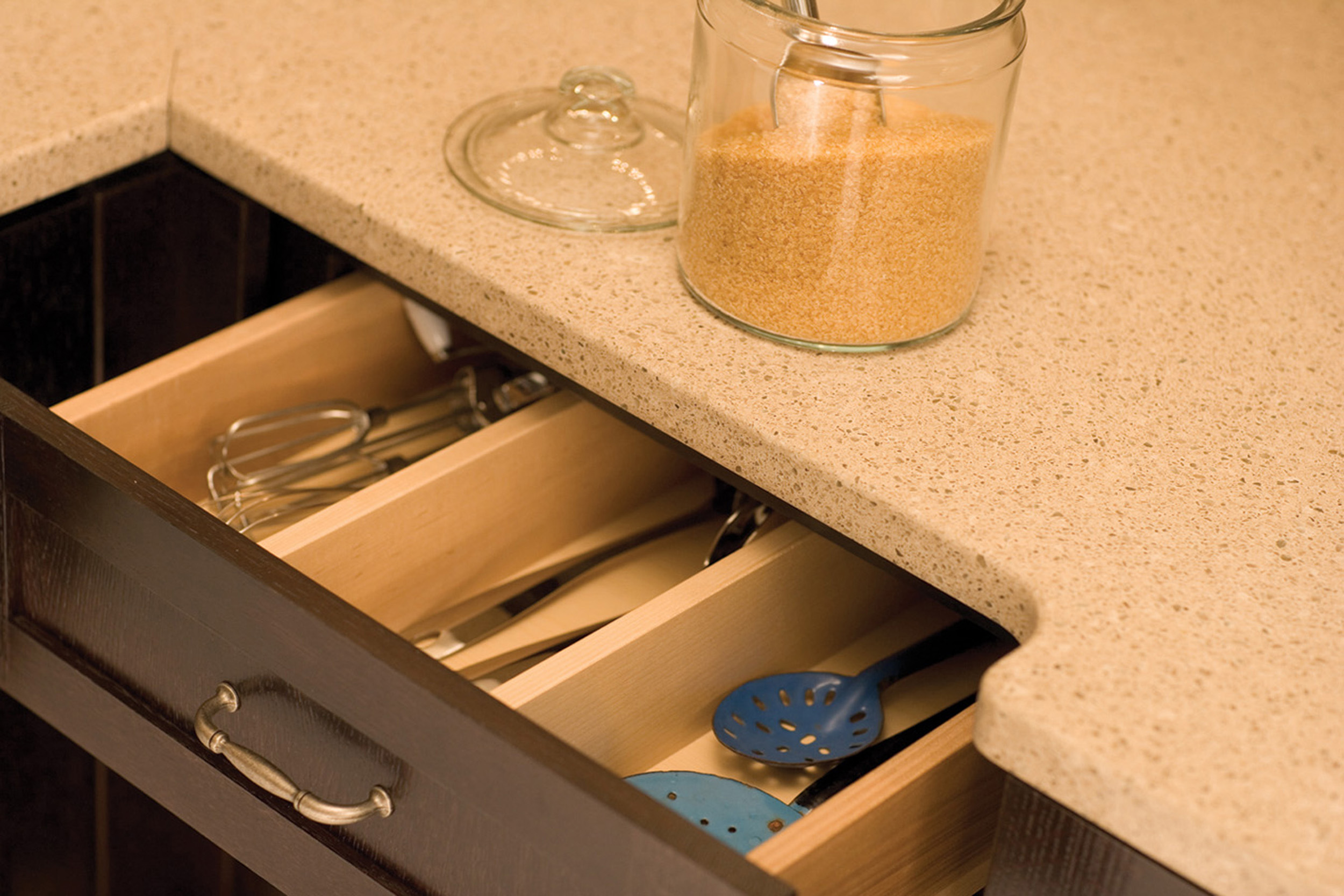 Drawer partitions can be specified to divide a drawer based on your personal preferences. Kitchen Drawer Storage from Dura Supreme Cabinetry.