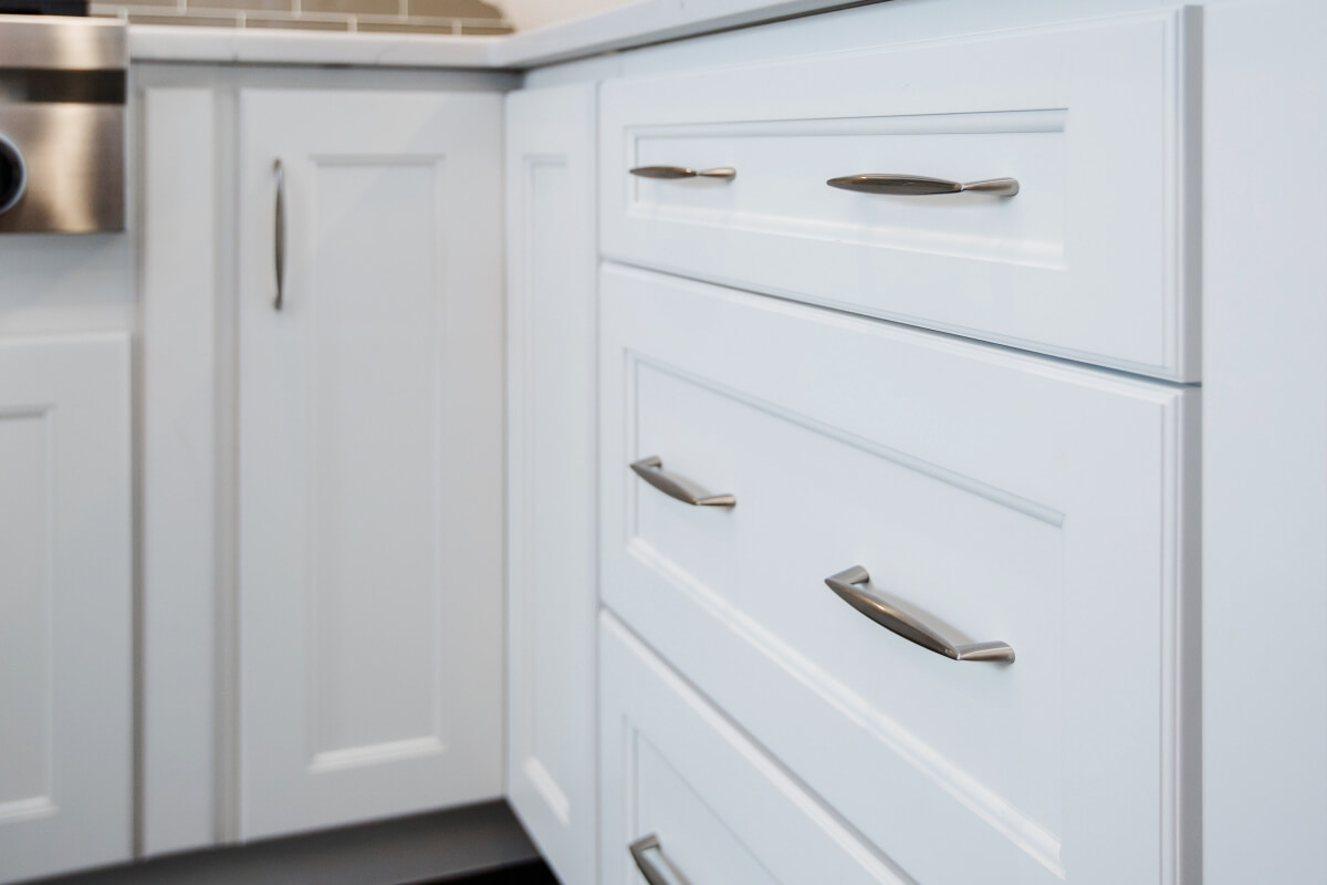 A close up of a corner cabinet door in a Dura Supreme kitchen.