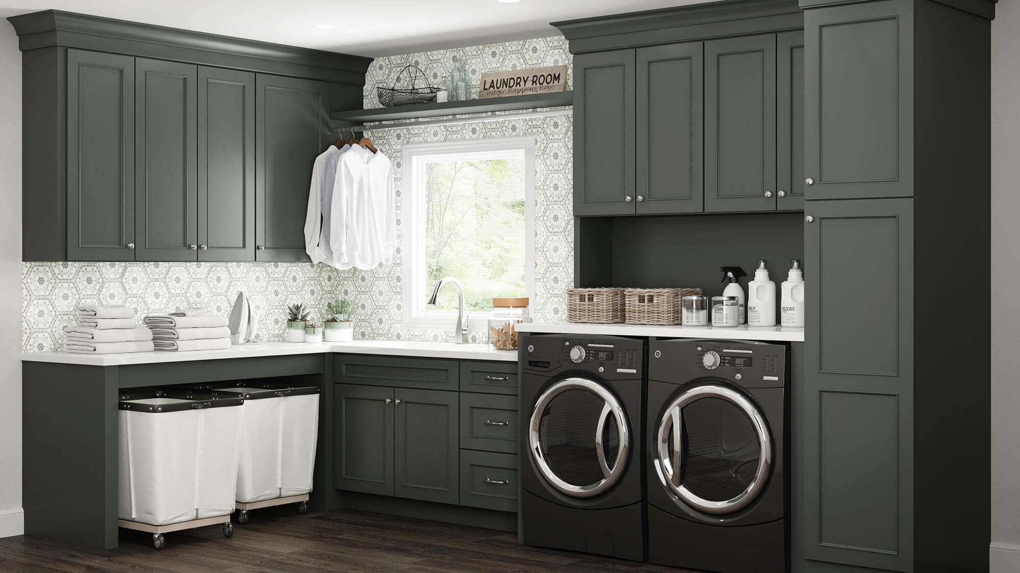 An earthy and colorful laundry room design with dark green and moody cabinets from Dura Supreme Cabinetry.