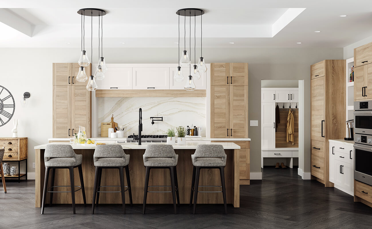 A stunning Scandinavian style kitchen with scandi style cabinet doors and finishes featuring Dura Supreme Cabinetry's Bria Cabinetry. Bria cabinetry features frameless (full-access) construction inspired by European cabinet-making, blending high-tech with high-fashion sensibilities.