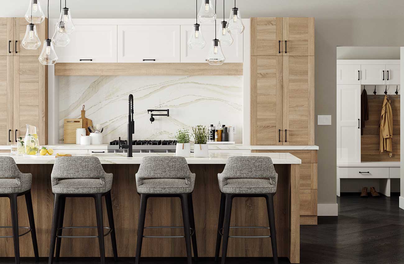 A modern Scandinavian style kitchen cabinets for dealers with off-white painted cabinets paired with textured Oak cabinets with wood plank-like doors.
