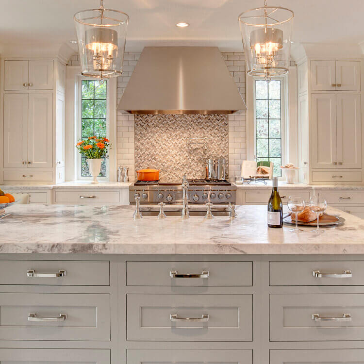 A blog story about classic gray and white color palettes used for kitchen designs and cabinetry selections.