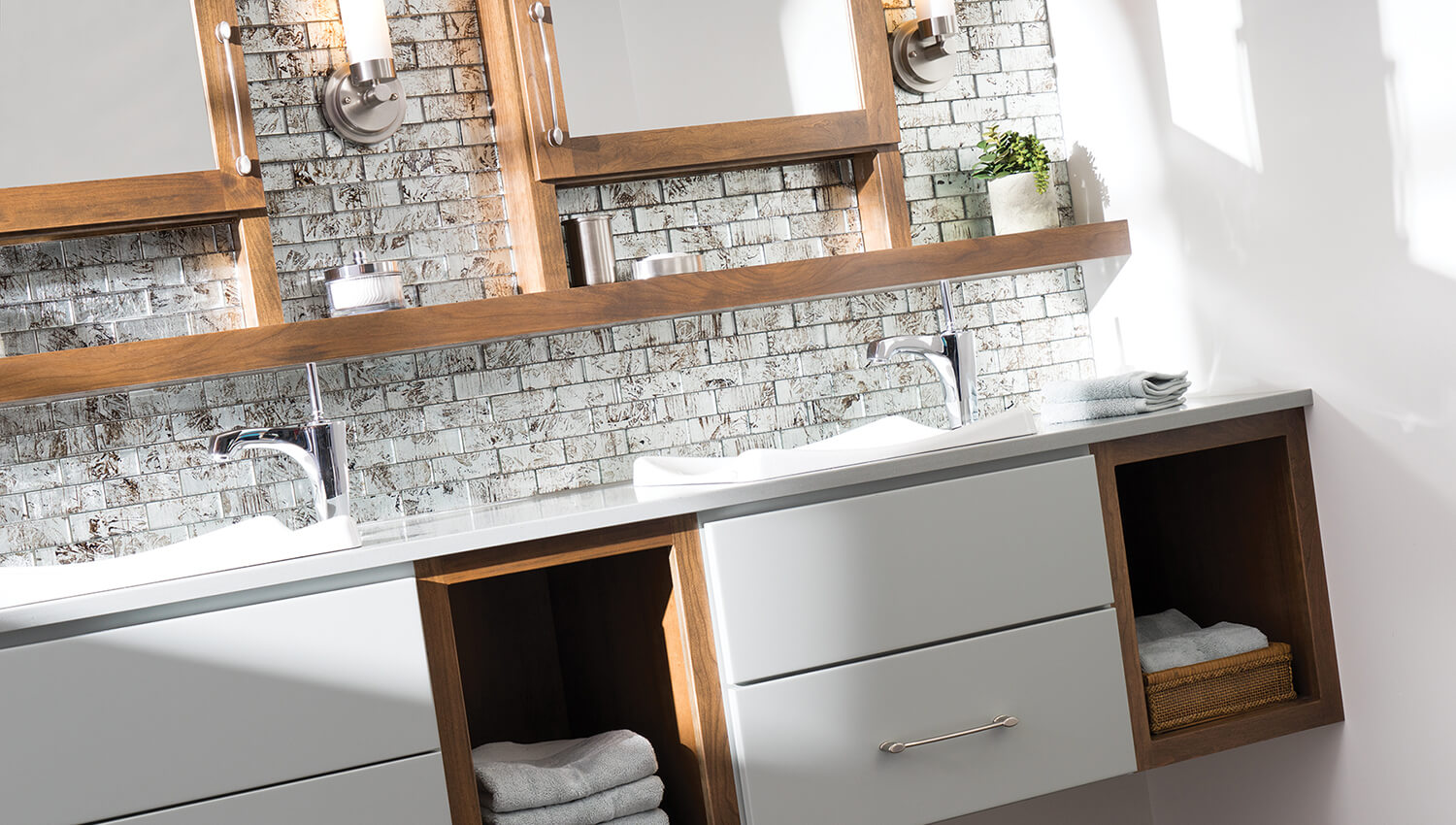 Floating Vanity and Medicine Cabinets from Dura Supreme Cabinetry with a Mid-Centurey Modern style.