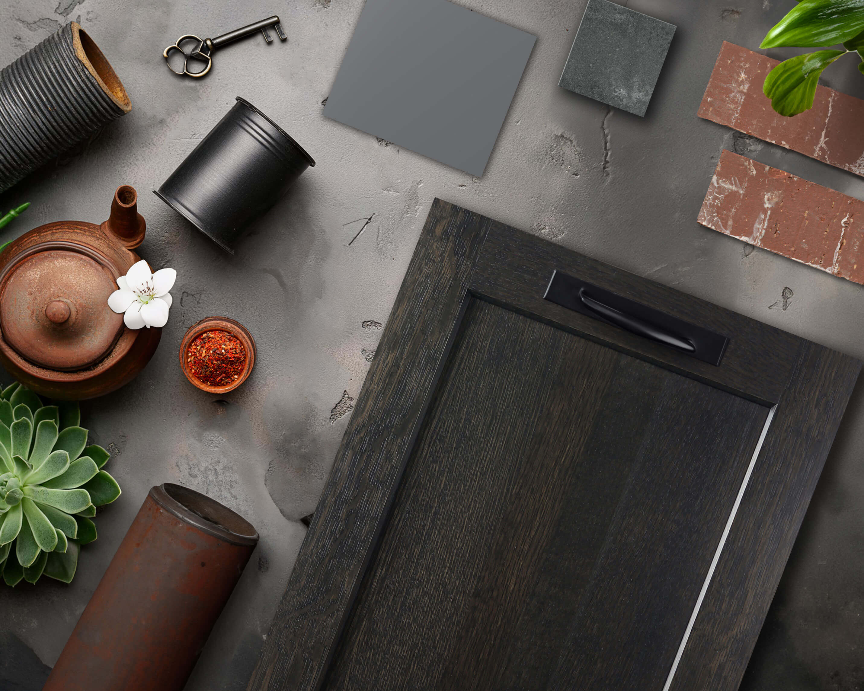 An industrial style kitchen design mood board with a black stained cabinet door and matte Foil in light gray.