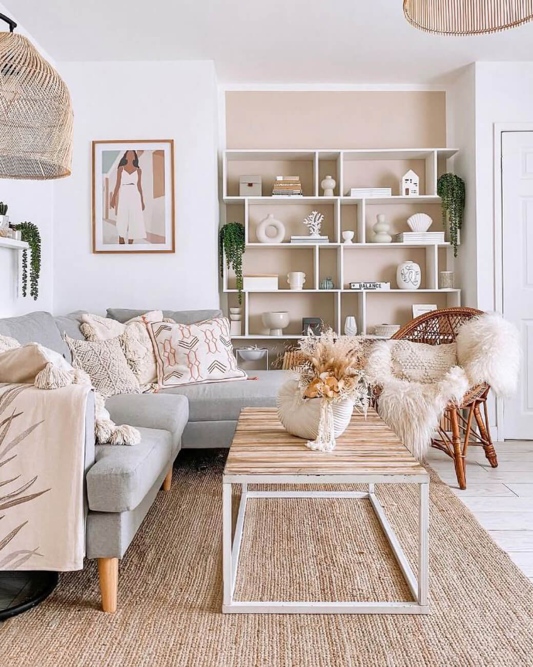 A beautiful Bohemian styled living room design with cozy, low-level furniture with a neutral color palette.