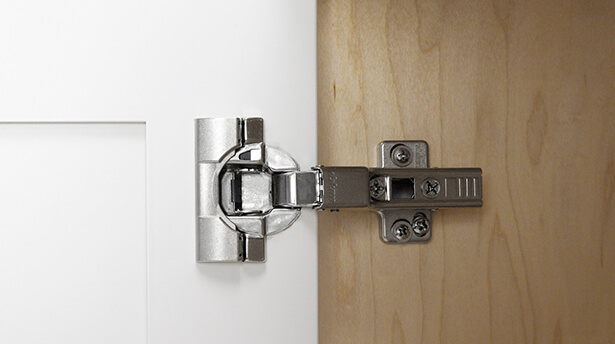 How to adjust an inset cabinet door hinge that is concealed.