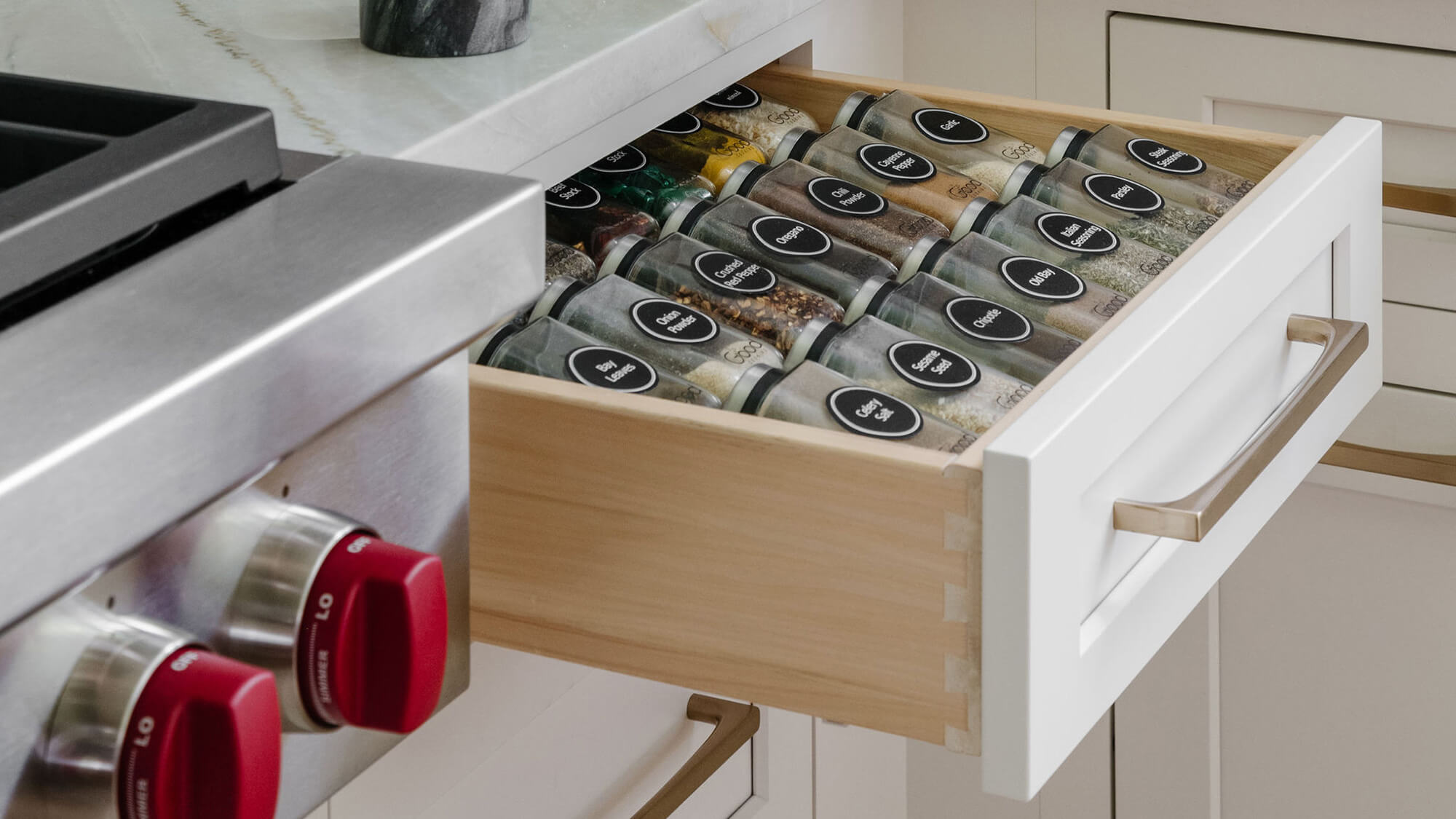 Keep your spices at your fingertips in this convenient, wood Drawer Spice Rack next to an oven or baking center. Kitchen Storage solutions for spice racks from Dura Supreme Cabinetry.